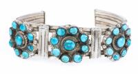 Ladies Sterling Silver and Turquoise Cuff with a Floral Motif